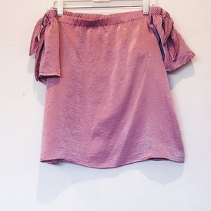 Off the shoulder pink silk shirt